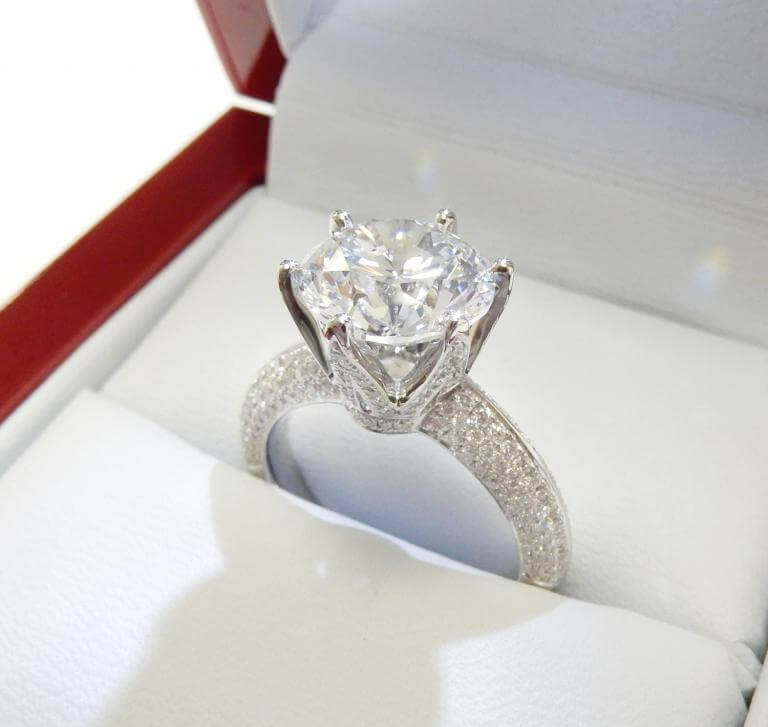 lced diamond siz prong solitaire engagament ring