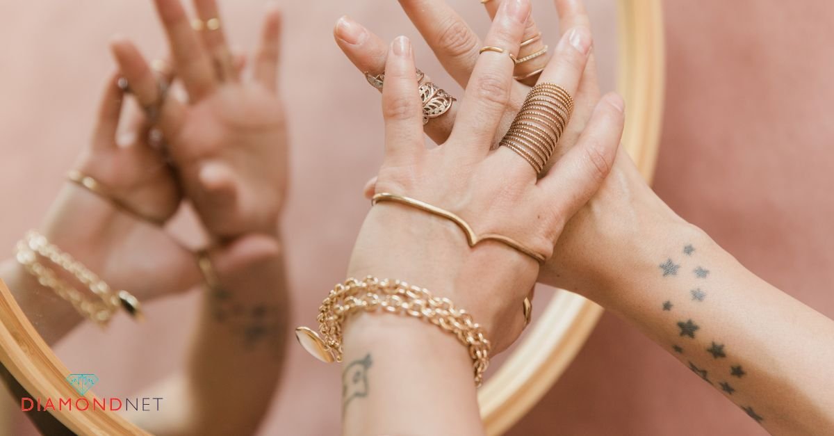 Two hands showcasing friendship bracelets