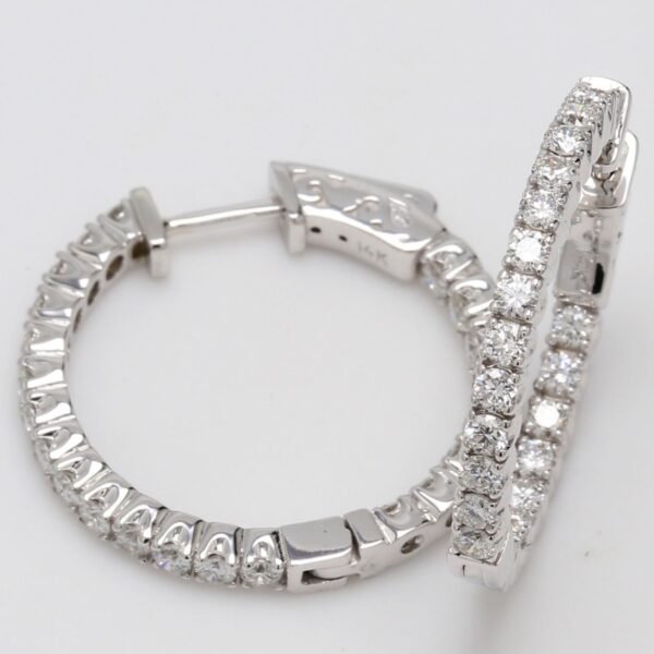 1' Inside out hoop earrings with 4-prong set round diamonds.  D1.52ct.t.w.