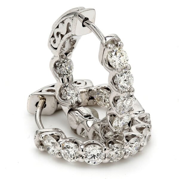 0.50 ' Inside out hoop earrings with U-prong set (18) round diamonds & with special spring lock.  D1.91ct.t.w.