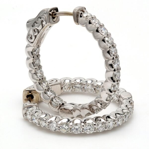 0.75' Inside out hoop earrings with shared prong set (38) round diamonds & with special spring lock.  D1.45ct.t.w.