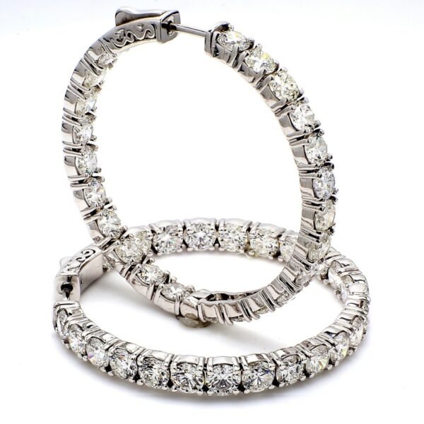 1.25' Inside out hoop earrings with 4-prong set (36) round diamonds & with special spring lock.  D5.08ct.t.w.