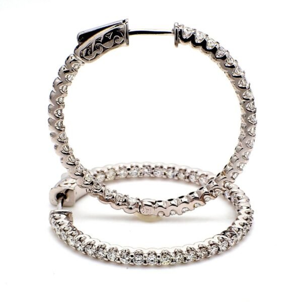 1.25' Inside out hoop earrings with (66) round diamonds & with special spring lock.  D2.22ct.t.w.