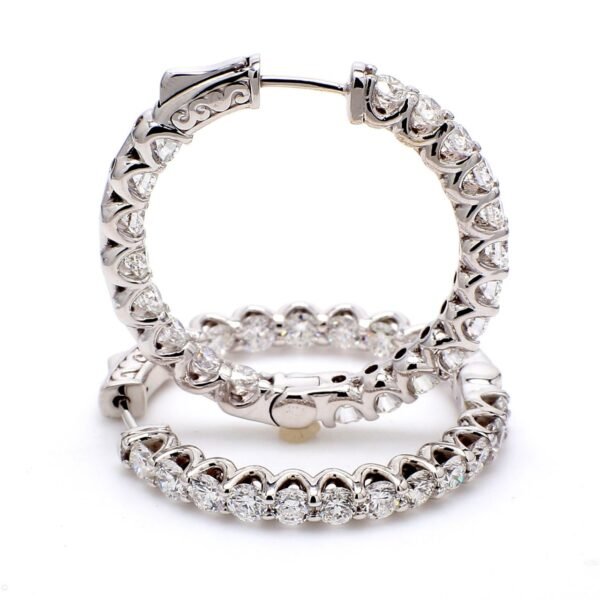 0.75' Inside out hoop earrings with U-prong set (28) round diamonds & with special spring lock.  D0.94ct.t.w.