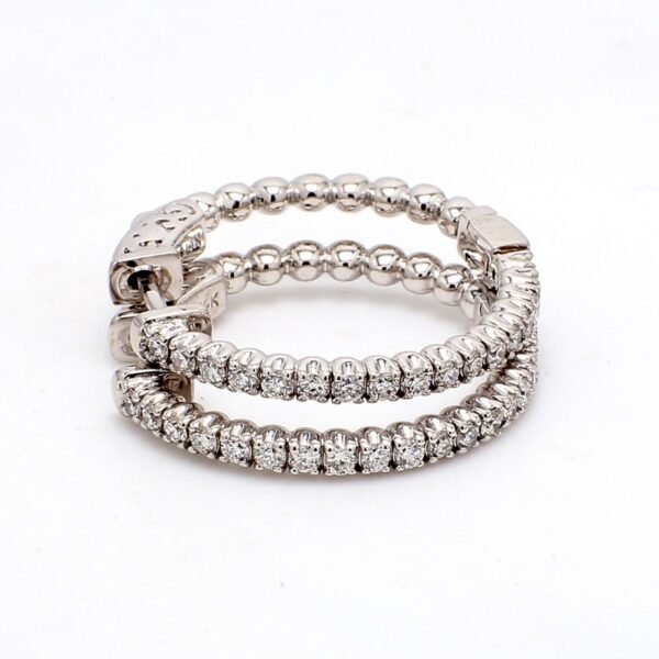 1' Hoop earrings with U-prong set (34) round diamonds & with special spring lock.  D0.77ct.t.w.