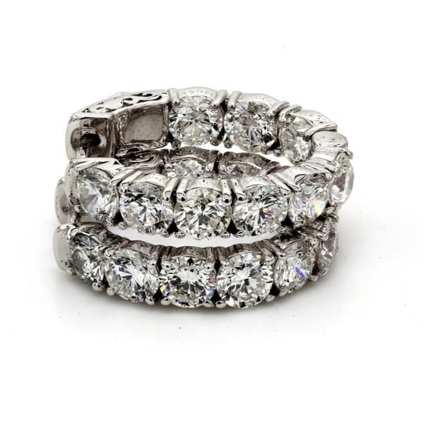 0.75' Inside out hoop earring with 4-prong set  round diamonds.  D2.68ct.t.w.
