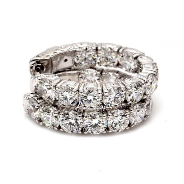 0.75' Inside out hoop earrings with 4-prong set (20) round diamonds & with special spring lock.  D5.00ct.t.w.