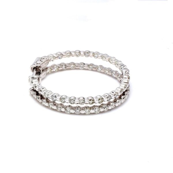 1' Inside out hoop earrings with channel set (54) round diamonds & with special spring lock.  D2.68ct.t.w.