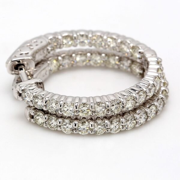 1' Inside out hoop earrings with prong set (40) round diamonds & with special spring lock.  D2.02ct.t.w.