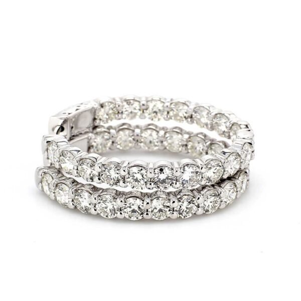 0.75' Inside out hoop earrings with prong set (30) round diamonds & with special spring lock.  D1.50ct.t.w.