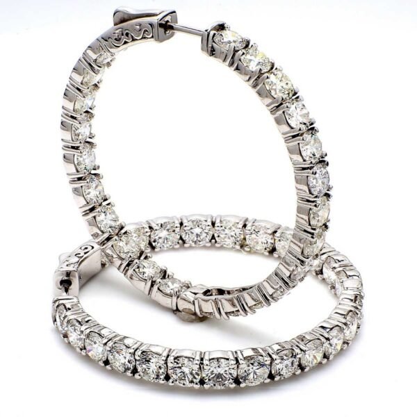 0.75' Inside out hoop earrings with 4-prong set (24) round diamonds & with special spring lock.  D3.82ct.t.w.
