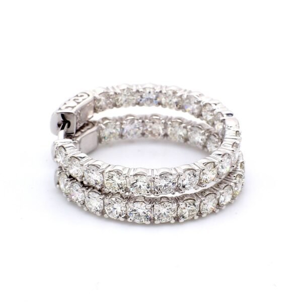 1' Inside out hoop earrings with 4-prong set (36) round diamonds & with special spring lock.  D5.41ct.t.w.