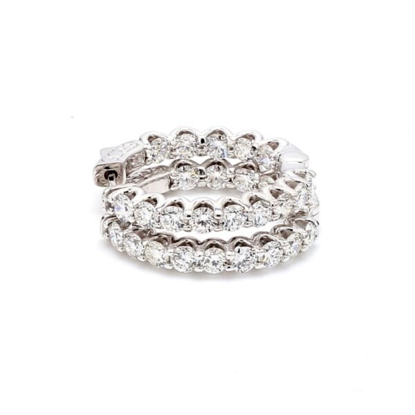 1' Inside out hoop earrings with shared U-prong set round diamonds.  D3.45ct.t.w.