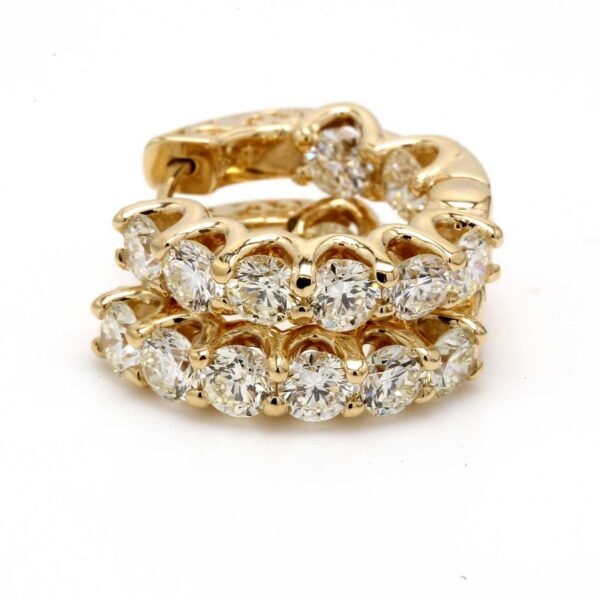 0.75' Inside out hoop earrings in yellow gold with shared U-prong set (16) round diamonds & with special spring lock.  D3.90ct.t.w.