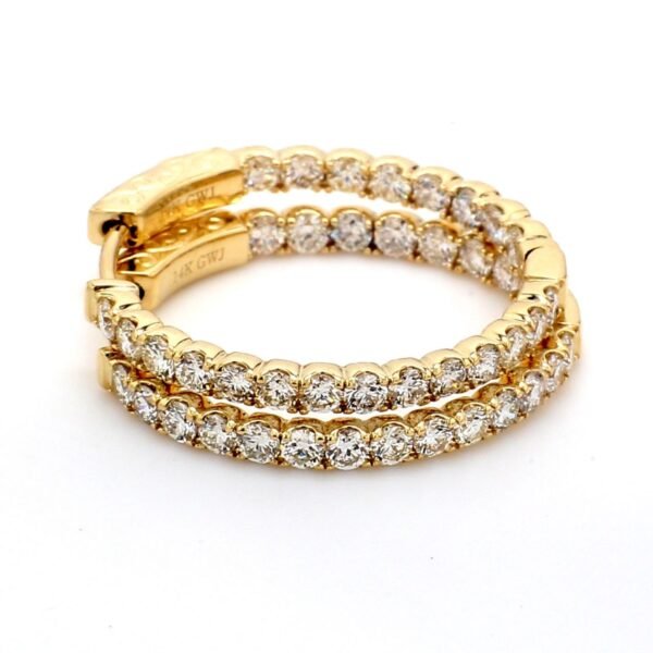 1' Inside out hoop earrings with U-prong set (44) round diamonds.  D1.67ct.t.w.