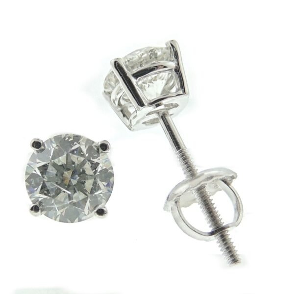 Screw back stud earrings with basket prong set round diamonds.   D0.60ct.t.w.