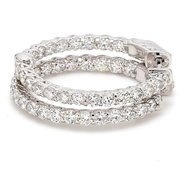 1' Inside out hoop earrings with prong set (44) round diamonds.  D2.19ct.t.w.