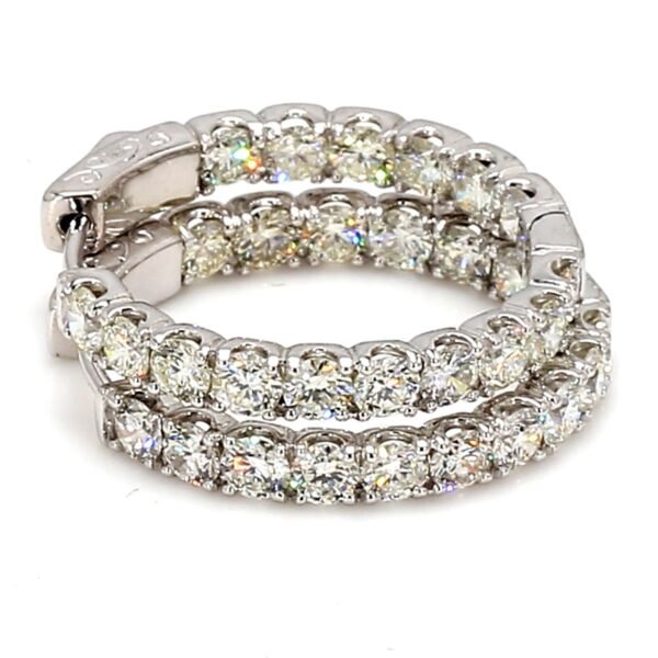 0.75' Inside out hoop earrings with prong set round diamonds.  D3.14ct.t.w.