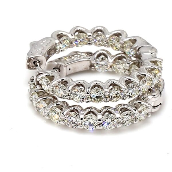1' Inside out hoop earrings with U-prong set (28) round diamonds.  D3.55ct.t.w.