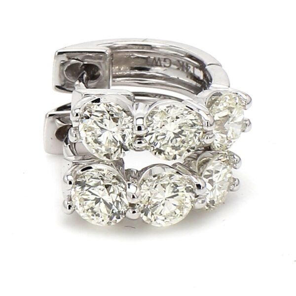 0.50' Huggy earrings with shared prong set (6) round diamonds.  D1.76ct.t.w.