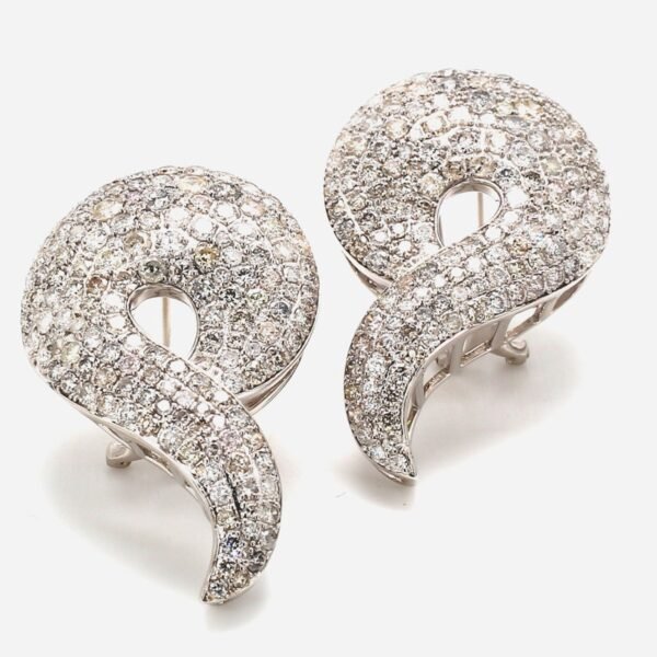 French clip back nautilus design earrings in 18K WG with pave set round diamonds.  D7.10ct.t.w.