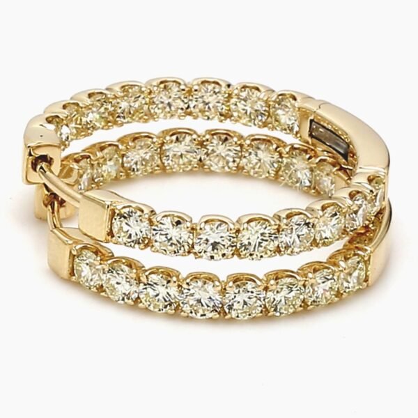 0.75' Inside out hoop earrings in 14K YG with prong set (32) round diamonds.  D2.90ct.t.w.