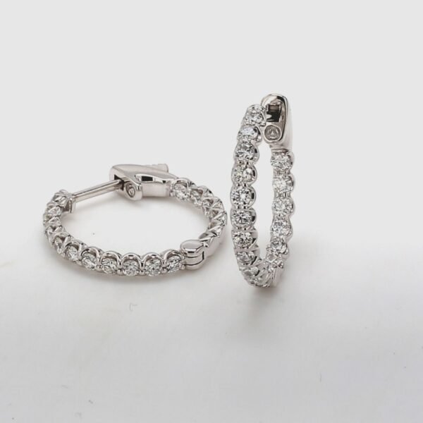 0.75' Inside out hoop earrings with U-prong set (34) round diamonds.  D1.05ct.t.w.