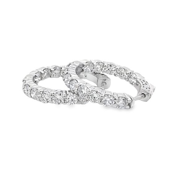 0.75' Inside out hoop earrings with prong set (26) round diamonds.  D3.51ct.t.w.