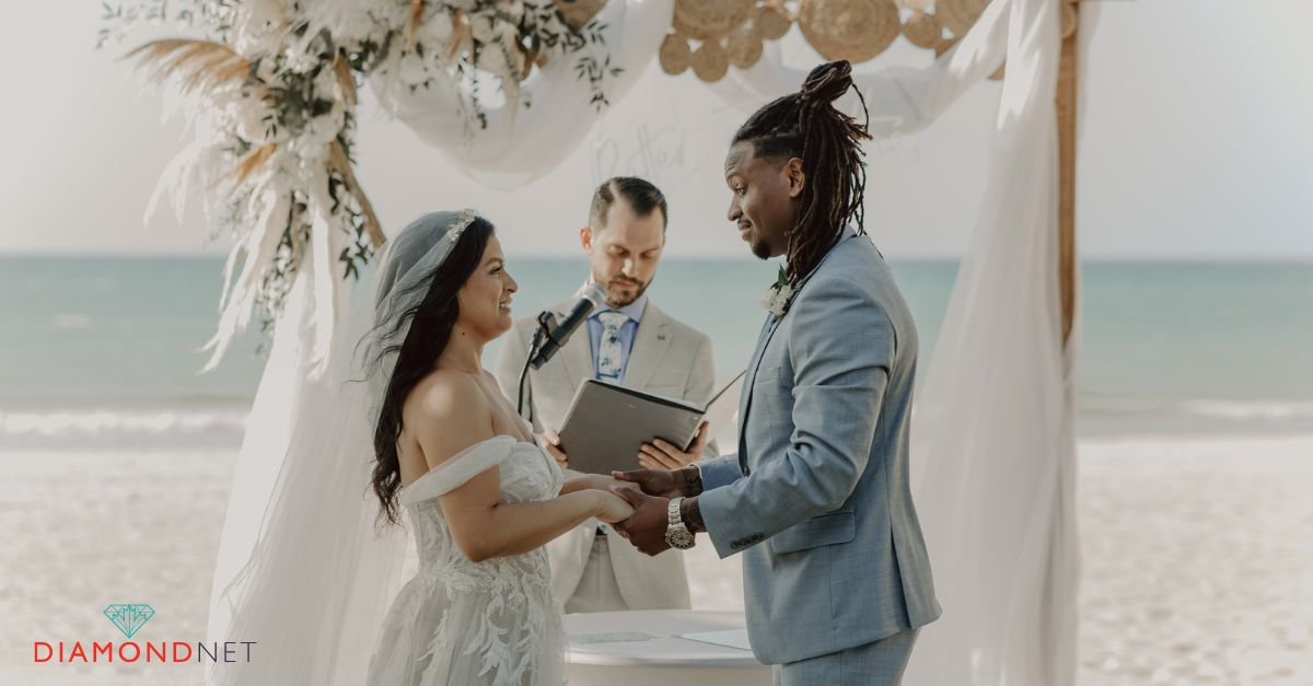A picturesque beach wedding ceremony featuring an altar, guests in proper attire
