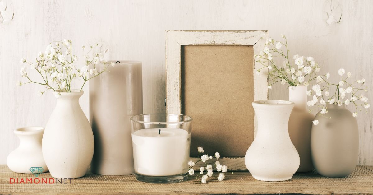 A beautifully arranged vase of flowers next to a mirror in a living room, perfect for unique engagement presents