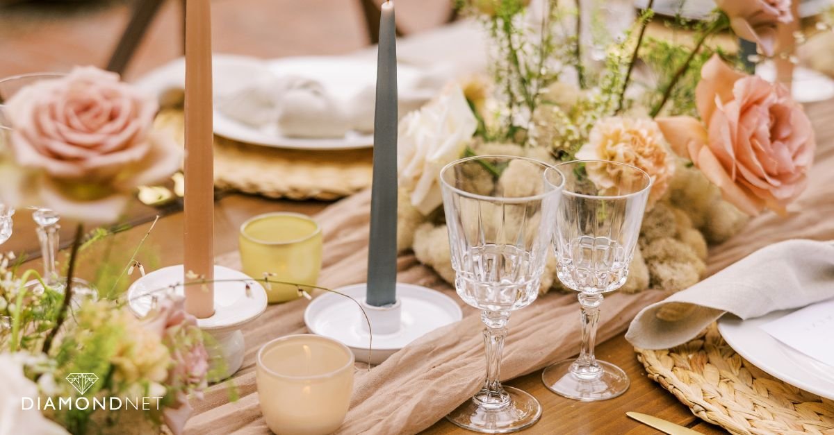 A table set with various budget-friendly food and drinks for an engagement party celebration