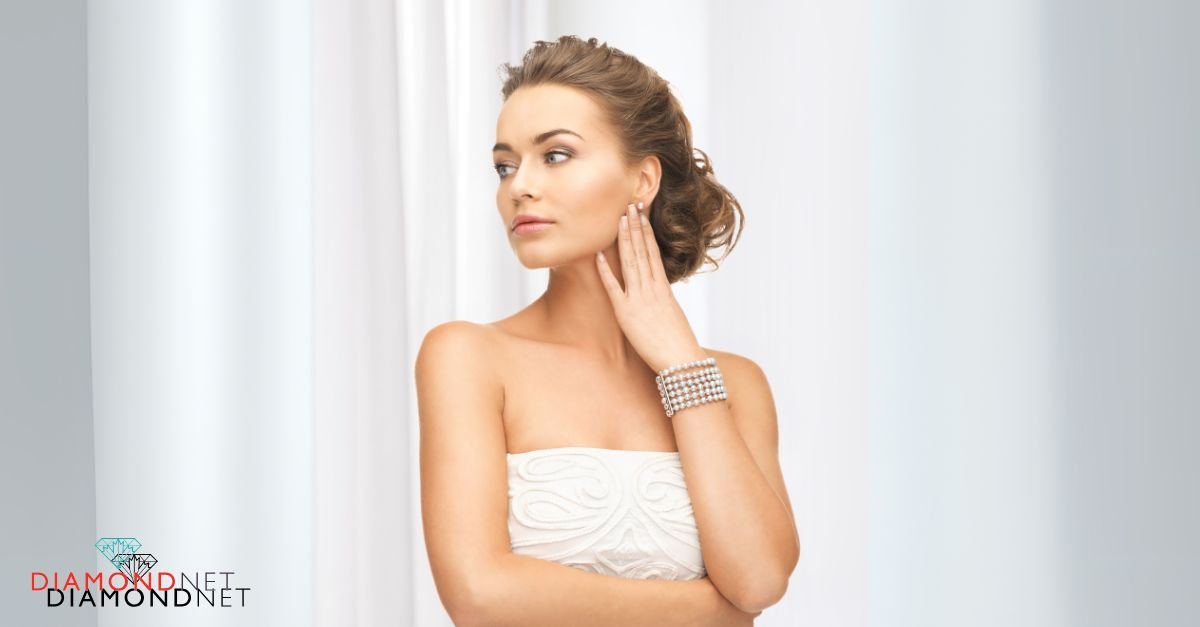A beautiful bride in a strapless wedding dress, adorned with sparkling diamond earrings
