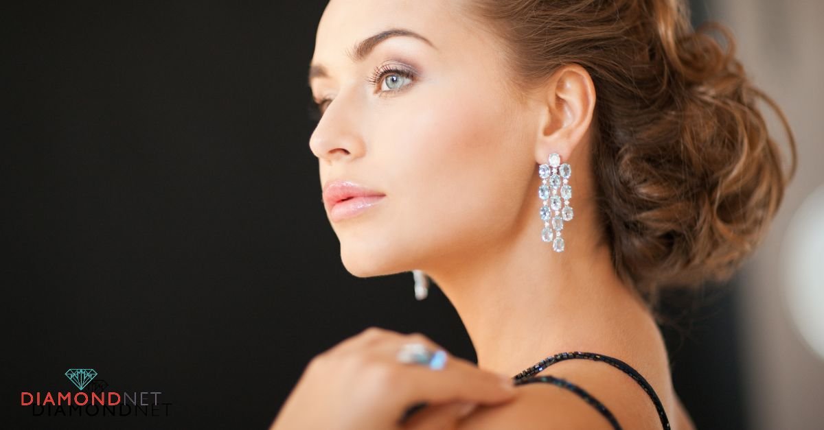 A woman models exquisite diamond hoop earrings, emphasizing their shine and fashionable appeal in her overall look