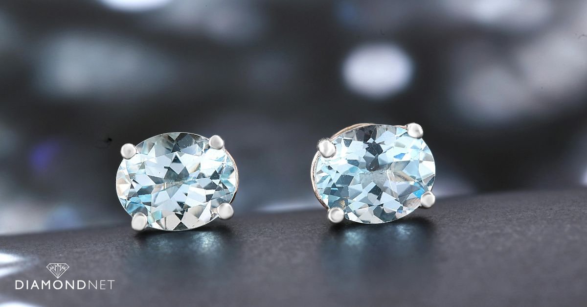 A hand gently cradles a diamond, emphasizing its elegance and quality for visual inspection