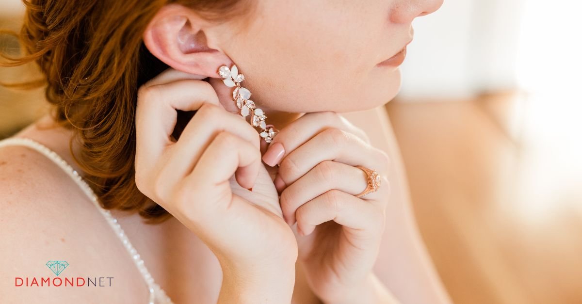 A woman wearing ethical diamond earrings, showcasing a stylish and sustainable accessory for daily wear