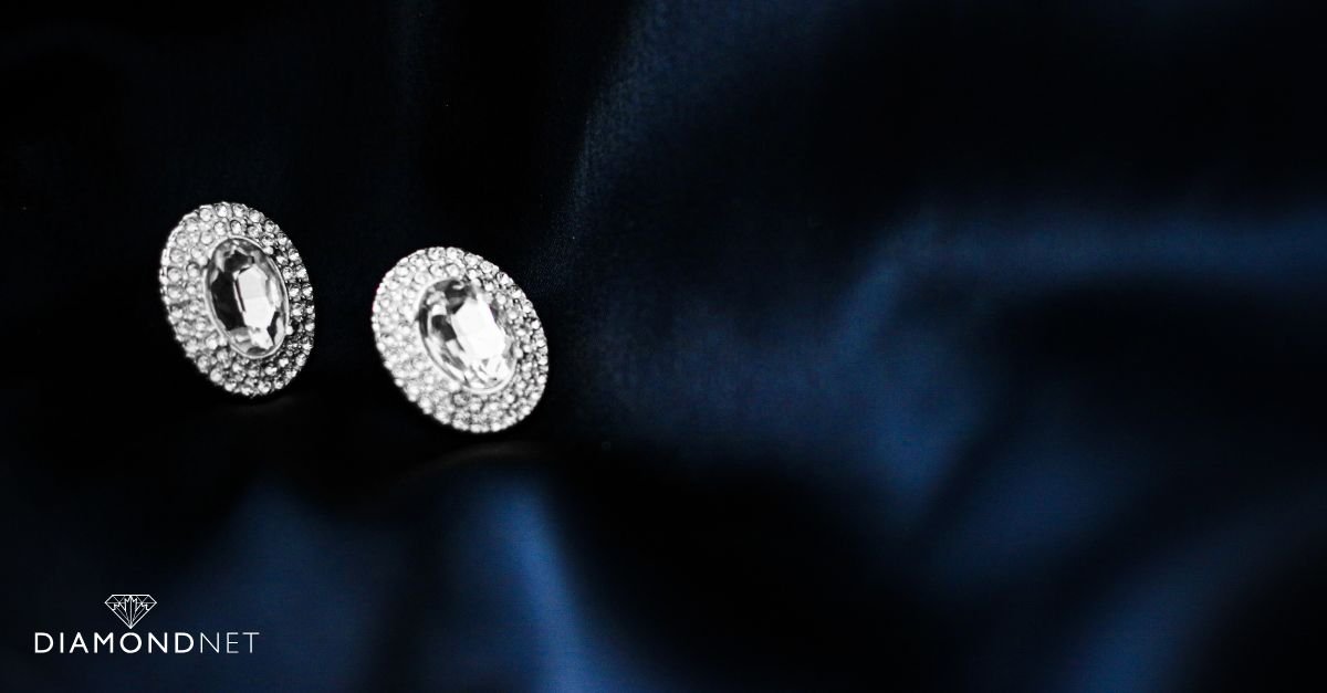 A close-up of a woman's hand showcasing a stunning diamond ring, highlighting jewelry maintenance tips