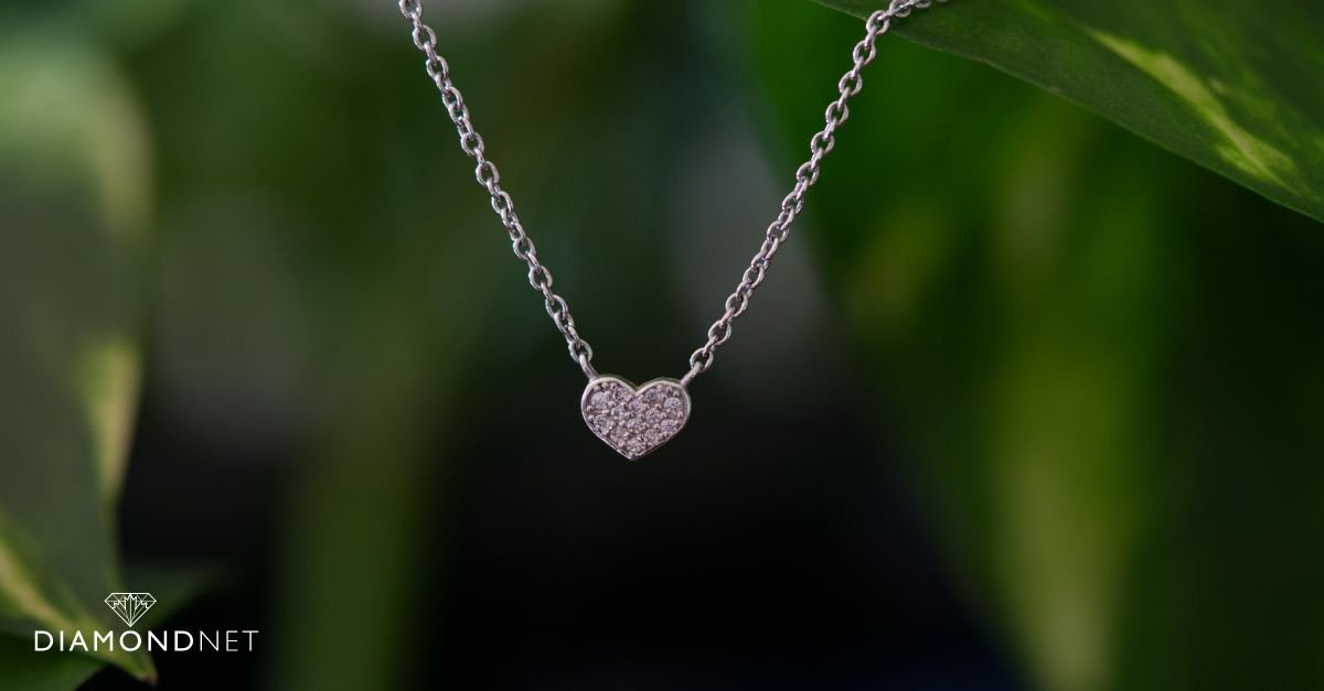 A layered set of gold and silver chain necklaces