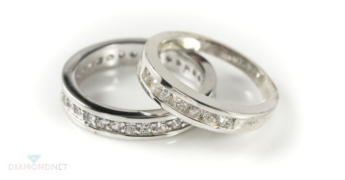 A woman wearing a channel-set diamond wedding band